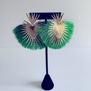 Green starbursts earrings